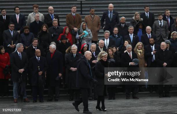 Following a brief stop of the hearse carrying the casket of the late Rep. John Dingell , Rep. Debbie Dingell , widow of Rep. John Dingell, returns to...