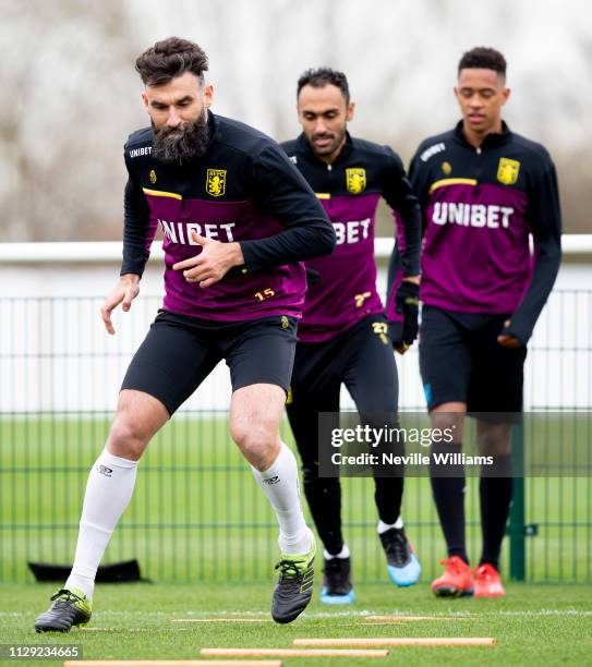 Mile Jedinak of Aston Villa in action during a training session at the club's training ground at Bodymoor Heath on March 08, 2019 in Birmingham,...