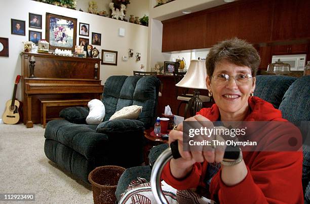 Diana Greene, of Tumwater, Washington, relaxes at home after having surgery to correct a nerve disorder called trigeminal neuralgia.