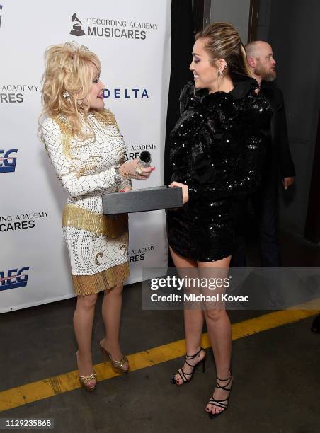 Dolly Parton and Miley Cyrus attend MusiCares Person of the Year honoring Dolly Parton at Los Angeles Convention Center on February 8, 2019 in Los...