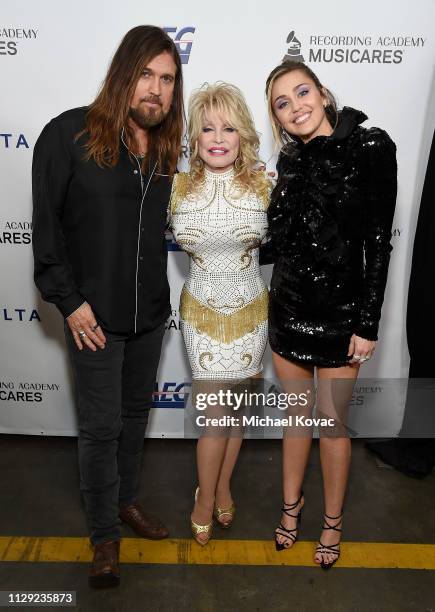 Billy Ray Cyrus, Dolly Parton and Miley Cyrus attend MusiCares Person of the Year honoring Dolly Parton at Los Angeles Convention Center on February...