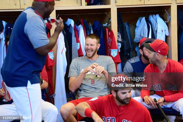 Boston Red Sox Chris Sale laughing with teammates in locker room during spring training photo shoot at JetBlue Park. Behind the Scenes. Fort Myers,...