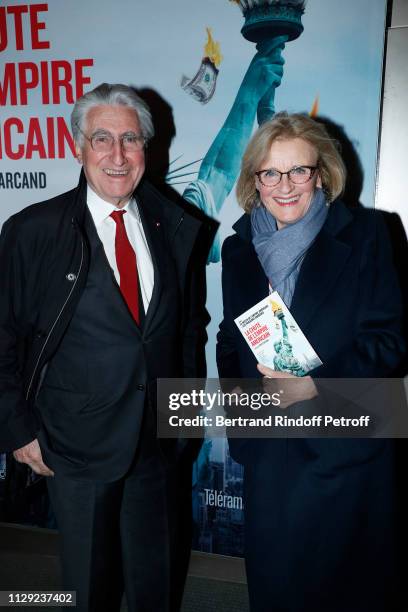 Baron Ernest-Antoine Seilliere and his wife Antoinette Barbey attend "La Chute de l'Empire Americain" : Photocall at Cinema UGC Normandie on February...