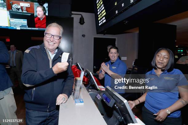 Ron Jaworski places first bet at the opening of William Hill Sports Book at Tropicana Atlantic City on March 8, 2019 in Atlantic City, New Jersey.