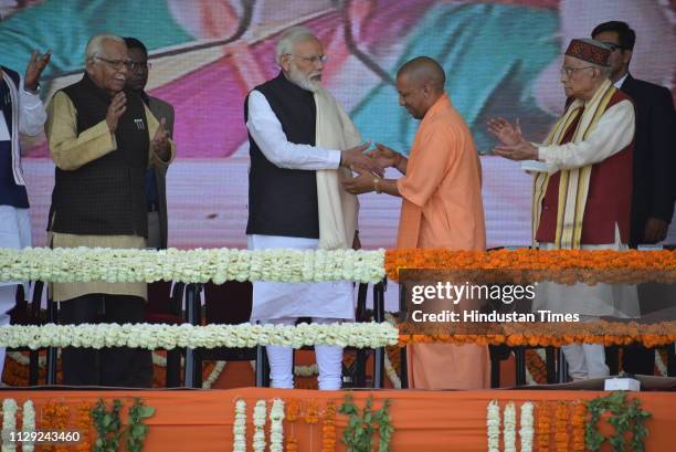 Prime Minister Narendra Modi is felicitated by Uttar Pradesh Chief Minister Yogi Adityanath during a public rally on March 8, 2019 in Kanpur, India....