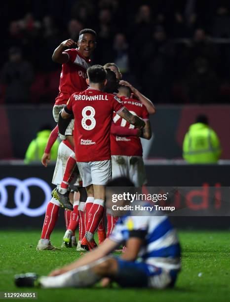 Niclas Eliasson of Bristol City celebrates on the final whistle with team mates after winning during the Sky Bet Championship match between Bristol...