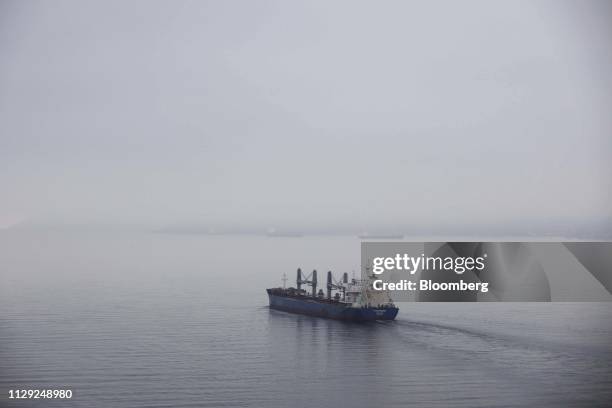 Bulk carrier vessel travels along the water near Lions Gate Bridge in Vancouver, British Columbia, Canada, on Wednesday, March 6, 2019. Canada's...