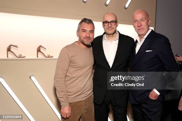 Stuart Weitzman Head of Design Edmundo Castillo, Tapestry CEO Victor Luis and Stuart Weitzman CEO Eraldo Poletto attend Stuart Weitzman Spring...