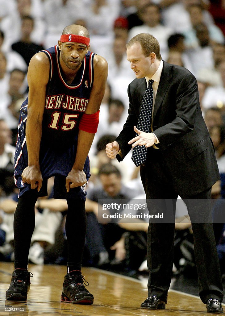 New Jersey Nets' head coach, Lawrence Frank talks to Vince C