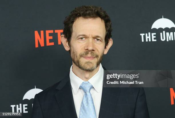 Adam Godley attends the Los Angeles premiere of Netflix's "The Umbrella Academy" held at ArcLight Hollywood on February 12, 2019 in Hollywood,...