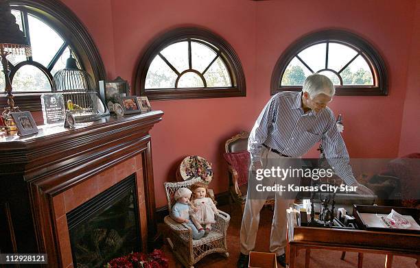 Roe Messner, husband of the late Tammy Faye, runs his hand across the type writer that Tammy used to write her notes and books as he talks about her...