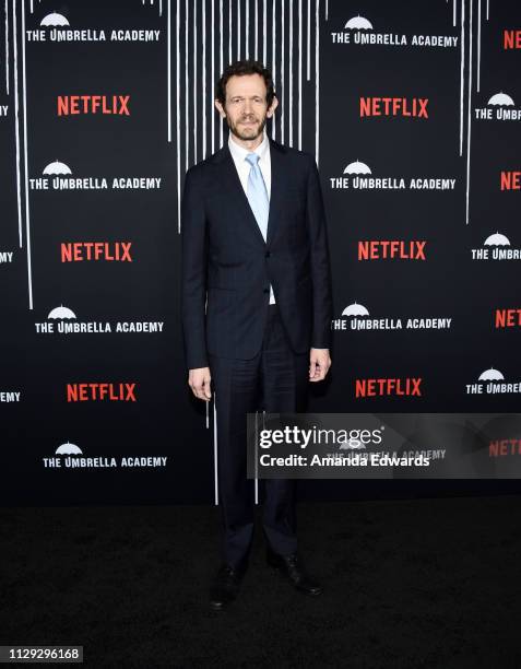 Adam Godley arrives at the premiere of Netflix's "The Umbrella Academy" at the ArcLight Hollywood on February 12, 2019 in Hollywood, California.