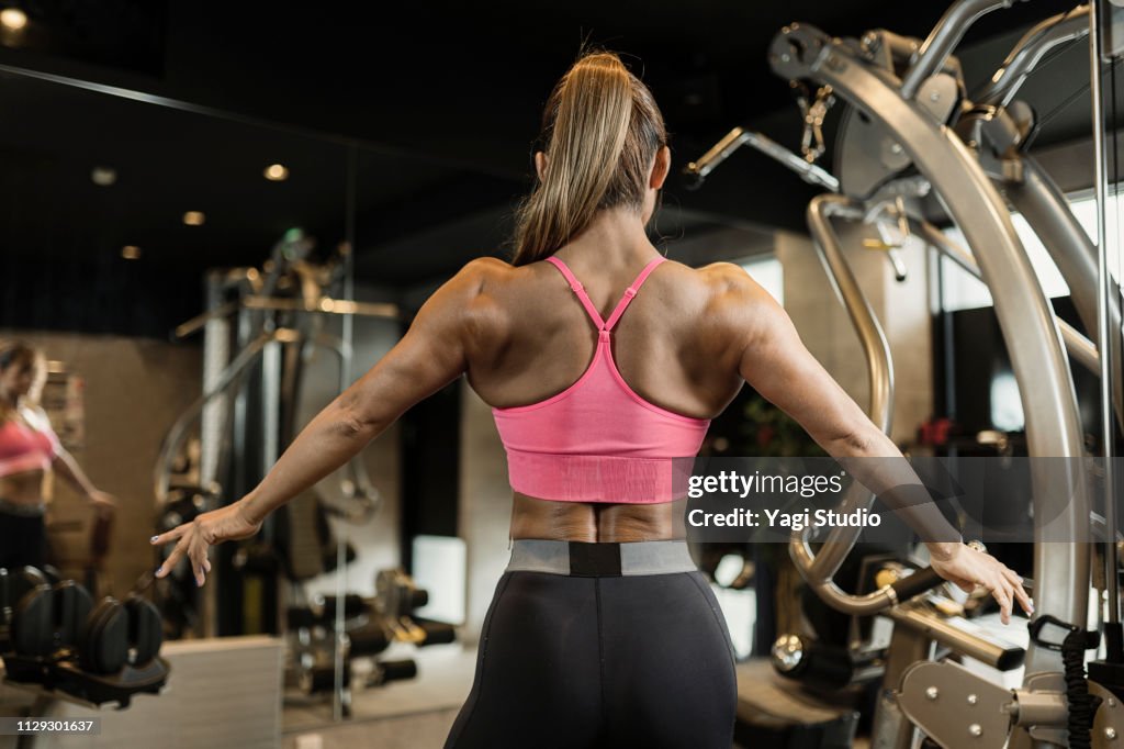 Fitness woman working out at Private gym