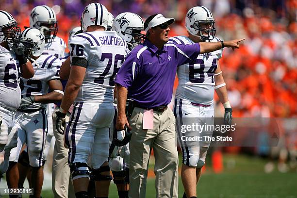 Furman head coach Bobby Lamb yells commands onto the field during the second quarter, Saturday, September 15 as Clemson mashed Furman 38-10 at...