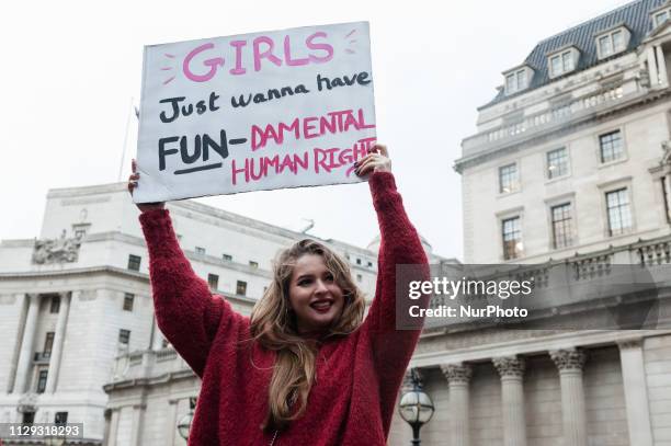 Several hundreds of women take part in Women's Strike outside the Bank of England in London on 08 March protesting against harassment, exploitation...