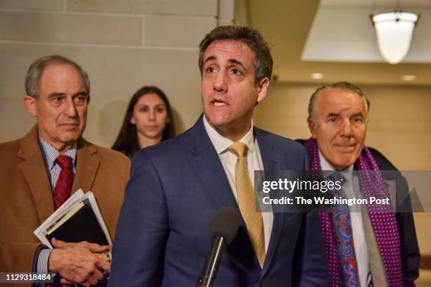 Michael Cohen, longtime lawyer for Donald Trump, leaves the hearing room at the U.S. Capitol after testifying before the House Intelligence Committee...