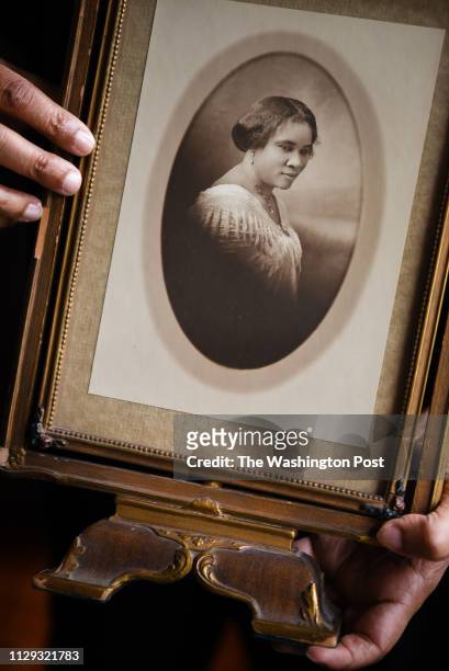 Lelia Bundles of DC, holds the iconic photo of her great great grandmother, Madam C.J. Walker. The photo was taken in 1913 by Addison Scurlock. The...