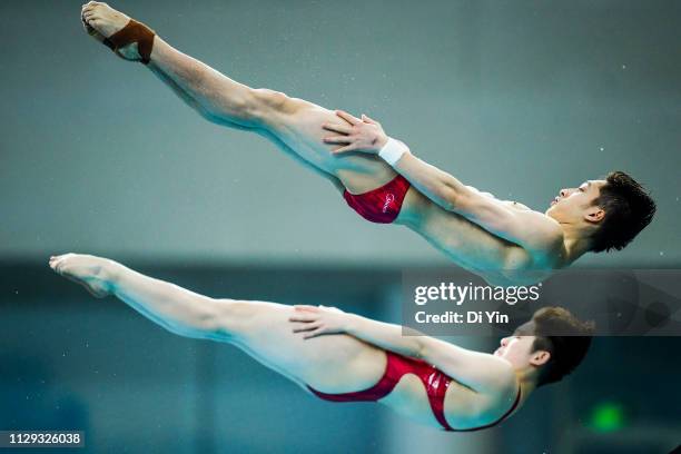 Junjie Lian and Yajie Si of China compete in Mixed 10m Synchronised Final of Diving World Series at Water Cube on March 9, 2019 in Beijing, China.