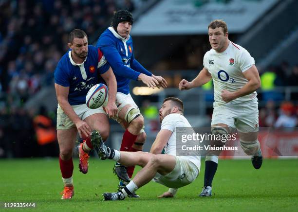 Of England and Louis Picamoles of France during the Guinness Six Nations match between England and France at Twickenham Stadium on February 10, 2019...