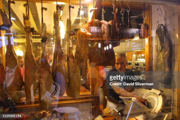 Serano ham is sliced to order at a Pinchos bar on September 29, 2018 in Logrono, Spain. Similar to Tapas, along the Calle Laurel in Logrono in the...