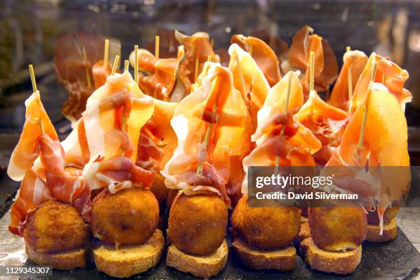 Typical Spanish dish of croquetas de jamón - croquettes with Sernao ham - on display at a Pinchos bar on September 29, 2018 in Logrono, Spain....