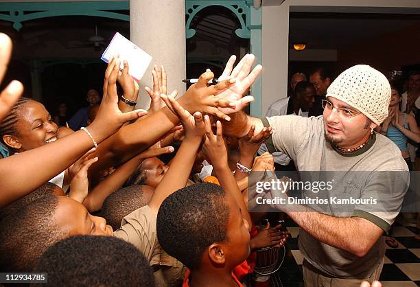 Chris Kirkpatrick greeting the Ocho Rios Primary School Choir