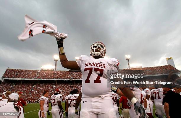 Oklahoma's Sherrone Moore celebrates after a defensive stop late in the fourth quarter against Texas on Saturday, October 6 at the Cotton Bowl in...