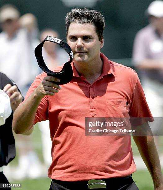 Daniel Chopra tips his hat to the crowd on 18 during the second round of the Cialis Western Open on Friday, July 7 at Cog Hill Golf and Country Club...