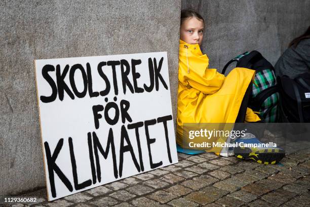 Fifteen year old Swedish student Greta Thunberg leads a school strike and sits outside of Riksdagen, the Swedish parliament building, in order to...