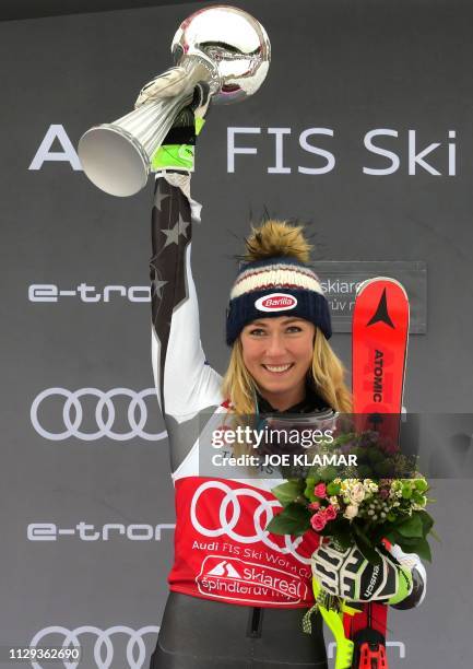 First placed Mikaela Shiffrin of US celebrates on the podium after the women's slalom at the FIS Ski World cup in Spindleruv Mlyn, Czech Republic, on...