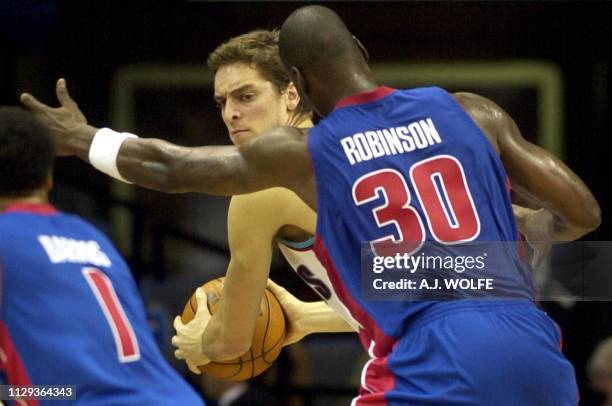 Memphis Grizzlies' Pau Gasol of Spain is guarded by Detroit Pistons' Clifford Robinson in the third quarter of the Pistons 90-80 win at the Pyramid...