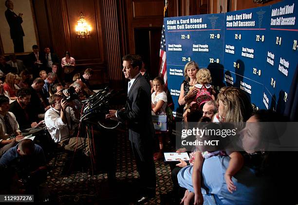 Sen. Sam Brownback takes part in a Capitol Hill news conference in Washington, Monday, July 17, 2006 on stem cell research. In the center background...