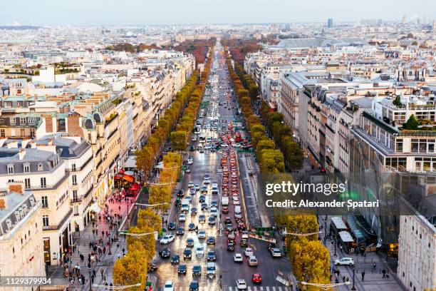 street traffic at avenue des champs-elysees, aerial view - quartier des champs élysées photos et images de collection