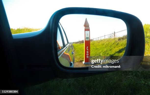 sos emergency road telephone box - emergency telephone box stock pictures, royalty-free photos & images