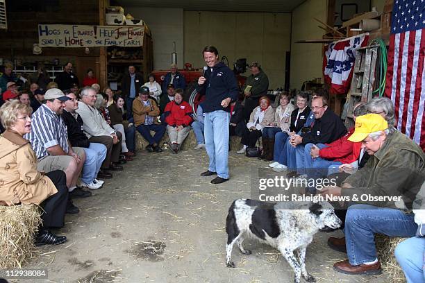 Presidential candidate John Edwards is interrupted when Ben Jones, known for his role as "Cooter" on the Dukes of Hazzard show, calls to a dog while...