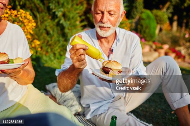 4th of july picnic - mustard stock pictures, royalty-free photos & images