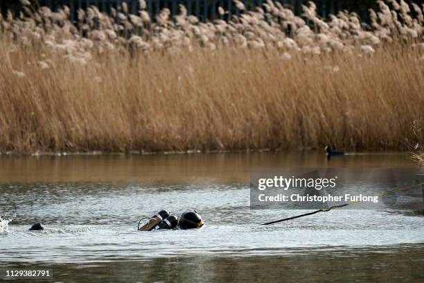 Police divers search the lake in Oak Road Park in Hull near to the home of missing 21-year-old student Libby Squire on February 13, 2019 in Hull,...