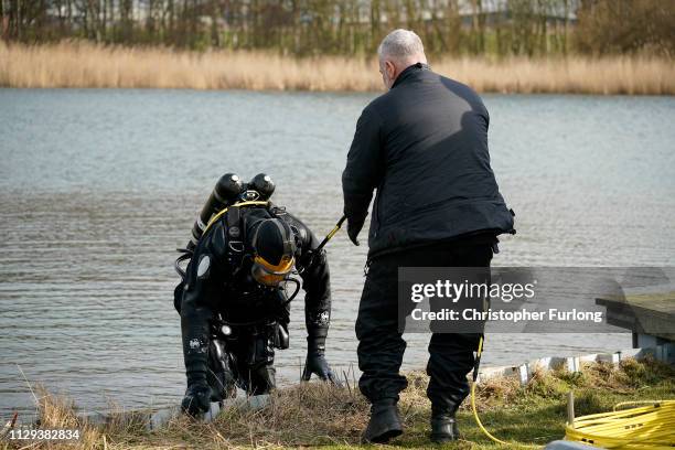 Police divers search the lake in Oak Road Park in Hull near to the home of missing 21-year-old student Libby Squire on February 13, 2019 in Hull,...