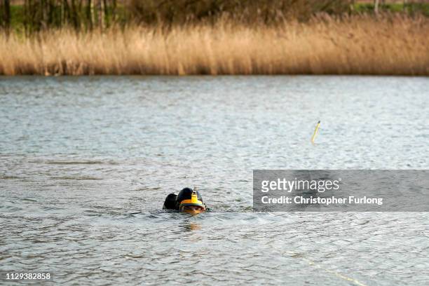 Police divers search the lake in Oak Road Park in Hull near to the home of missing 21-year-old student Libby Squire on February 13, 2019 in Hull,...