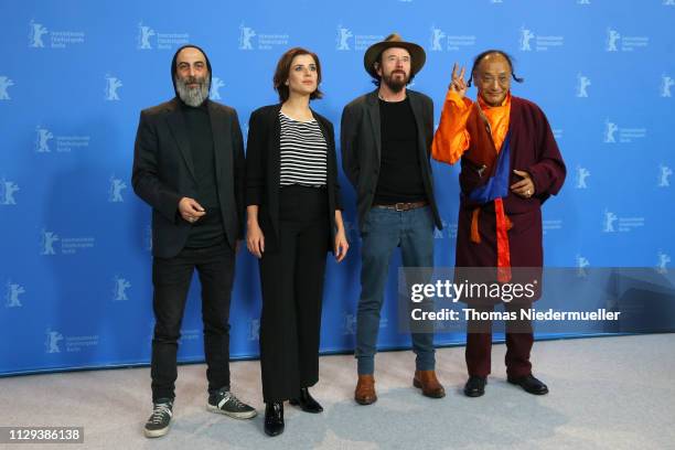 Ilker Abay, Eva-Maria Lemke, Uli M Schueppel and Lama Gelek Ngawang pose at the "The Breath" photocall during the 69th Berlinale International Film...