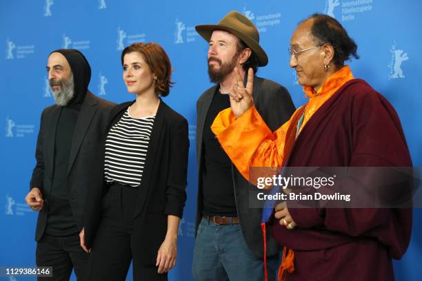 Ilker Abay, Eva-Maria Lemke, Uli M Schueppel and Lama Gelek Ngawang pose at the "The Breath" photocall during the 69th Berlinale International Film...