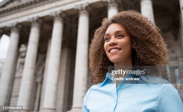 portrait of a successful african american business woman outdoors - lawyers stock pictures, royalty-free photos & images