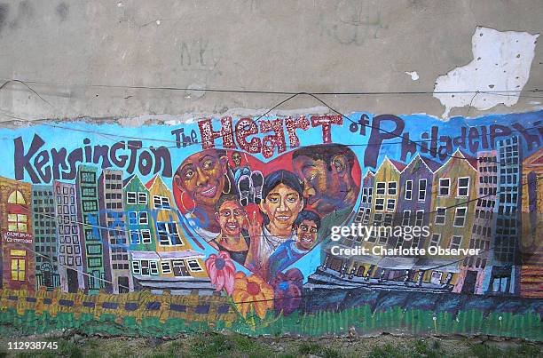 Mural on Philadelphia's Kensington Avenue in lot serves as a homemade park.