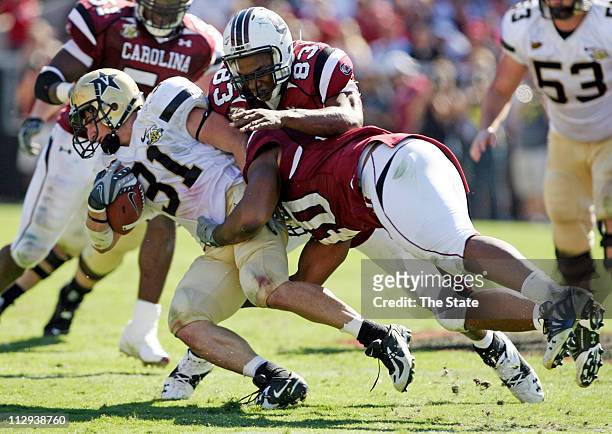 South Carolina's Cliff Matthews and Eric Norwood tackle Vanderbilt's Jared Hawkins in the third quarter. The Commodores defeated the Gamecocks 17-6...