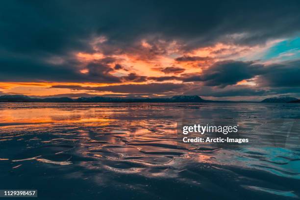 winter sunset, lake myvatn, iceland - abstract seascape stock pictures, royalty-free photos & images