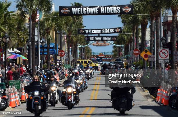 Motorcyclists parade down Main Street on March 8, 2019 for the opening day of Bike Week in Daytona Beach, Florida. The 10-day event, which draws...