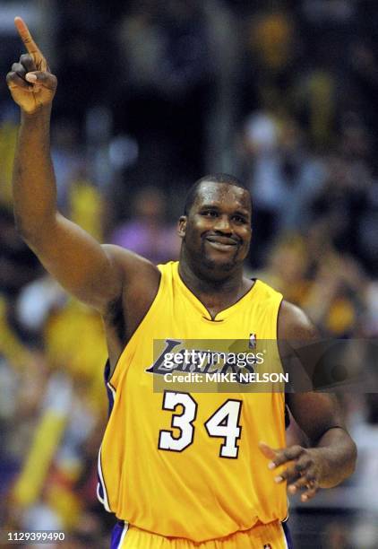 Shaquille O'Neal of the Los Angeles Lakers celebrates in the 4th quarter of game 3 of the NBA Western Conference Finals against the San Antonio Spurs...