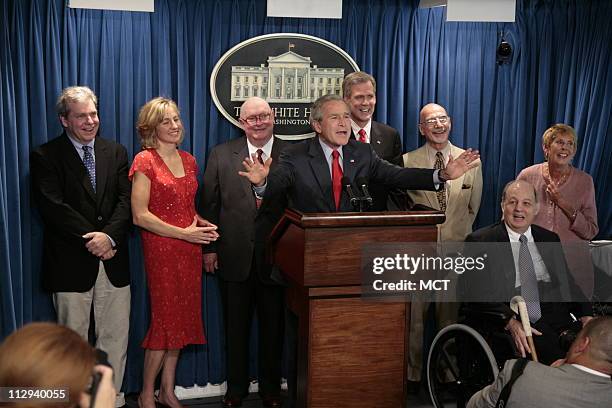 President George W. Bush jokes with the media in the press briefing room in the West Wing of the White House Wednesday, August 2, 2006 in Washington,...