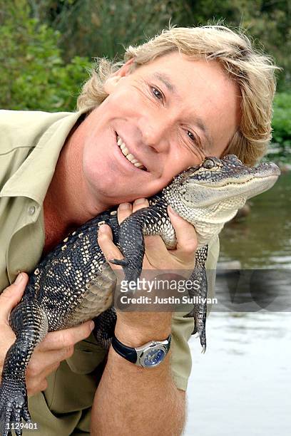 The Crocodile Hunter", Steve Irwin, poses with a three foot long alligator at the San Francisco Zoo on June 26, 2002 in San Francisco, California....