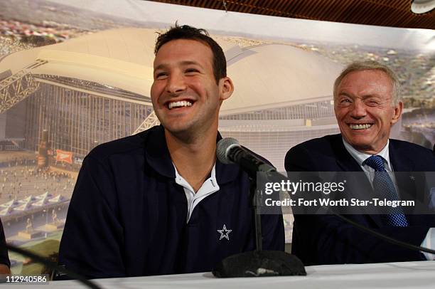 Jerry Signing Romo 13 Tony Romo Jerry Jones Photos & High Res Pictures - Getty Images